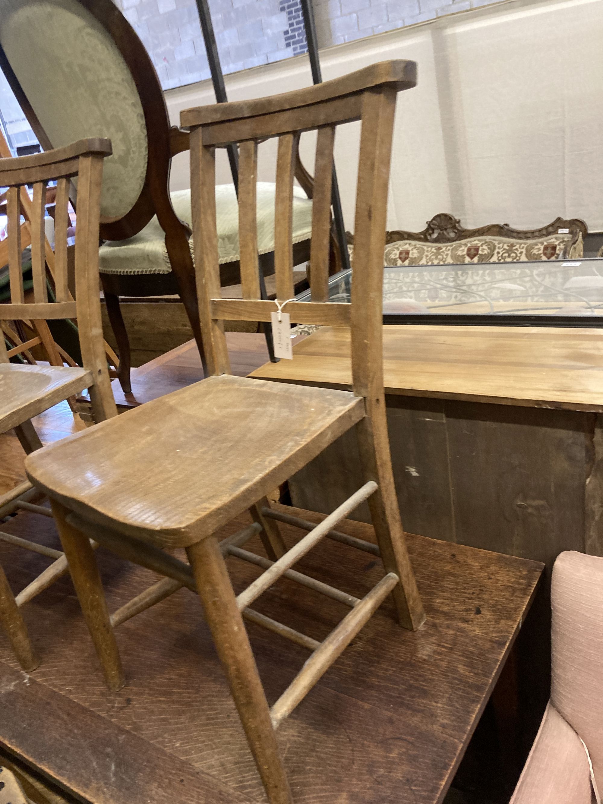 A late Victorian rectangular oak table, width 122cm, depth 69cm, height 74cm together with four church chairs